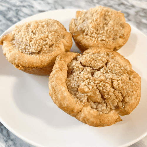 mini apple pies with sourdough crust and sugar crumble topping