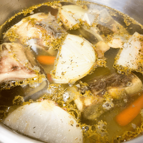 Homemade Bone Marrow Broth in a Stainless steel pot