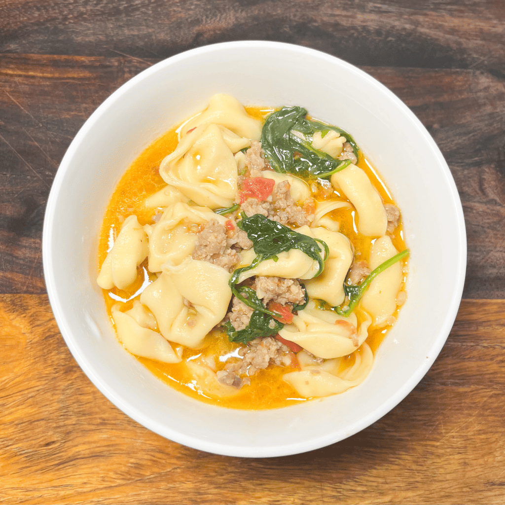 Creamy Spinach and Tortellini Soup with Italian Sausage
