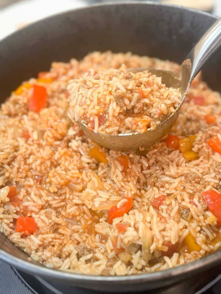 stuffed bell pepper soup in a black cast iron pot