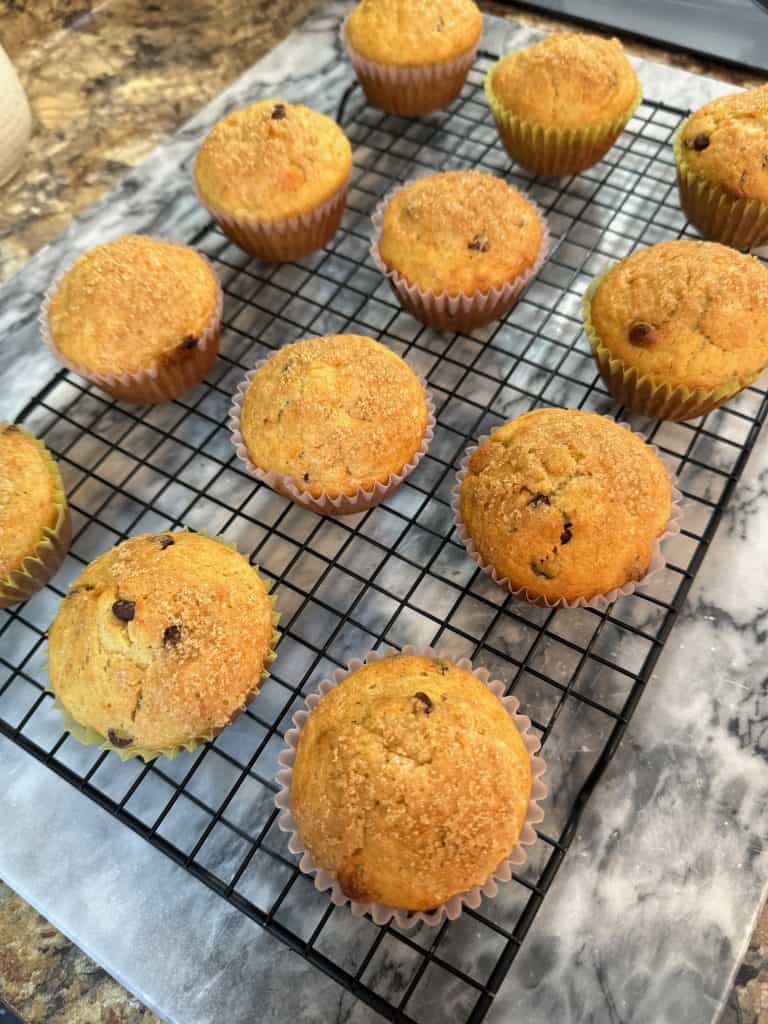 chocolate chip banana muffins cooling on a wire rack
