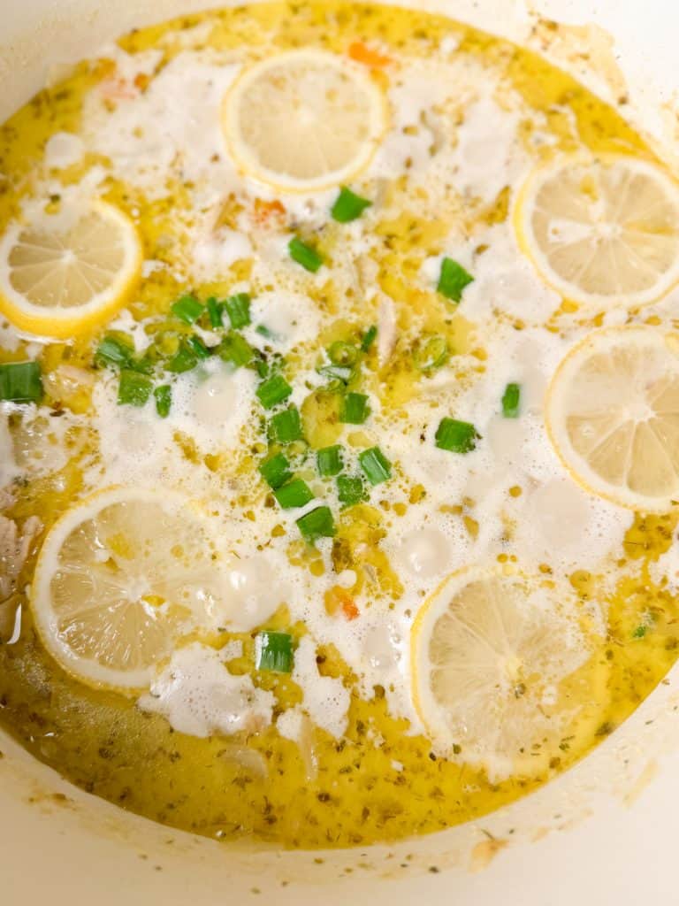 lemon chicken orzo soup in a large dutch oven