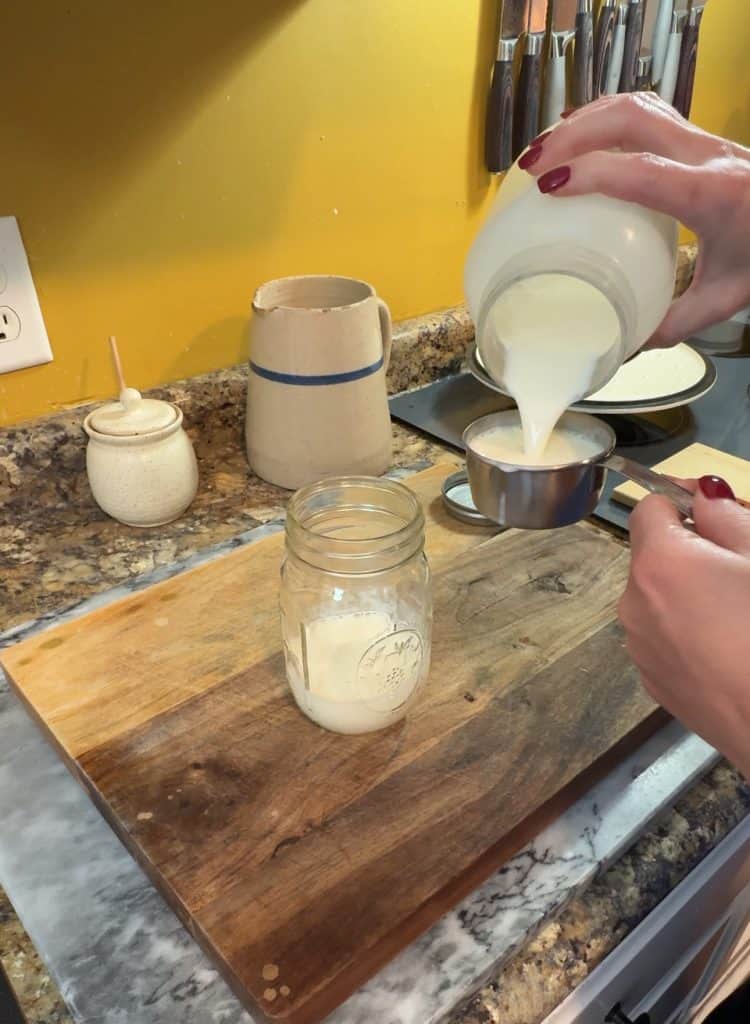 measuring buttermilk for Homemade Ranch Dressing