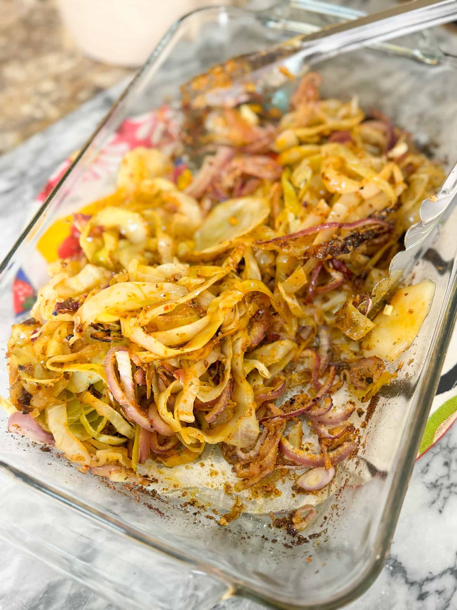 cabbage steaks in a glass baking dish