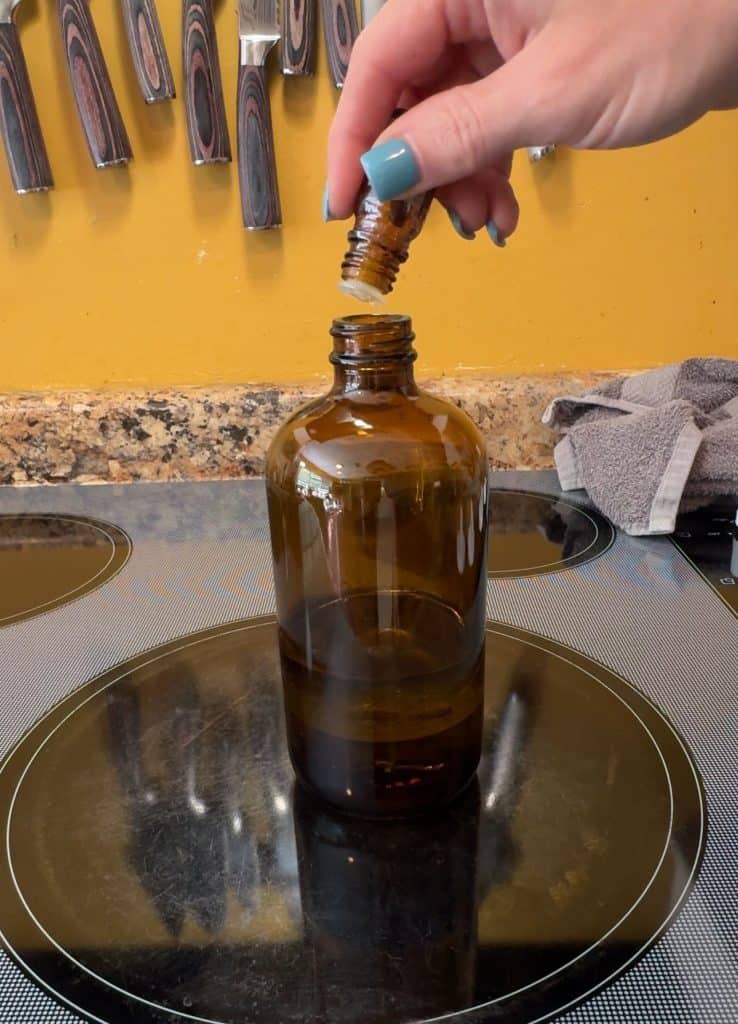 adding essential oils to DIY Wood Cleaner and Polish