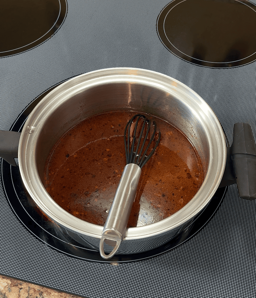 Sweet and Spicy Chili Sauce simmering in a pot