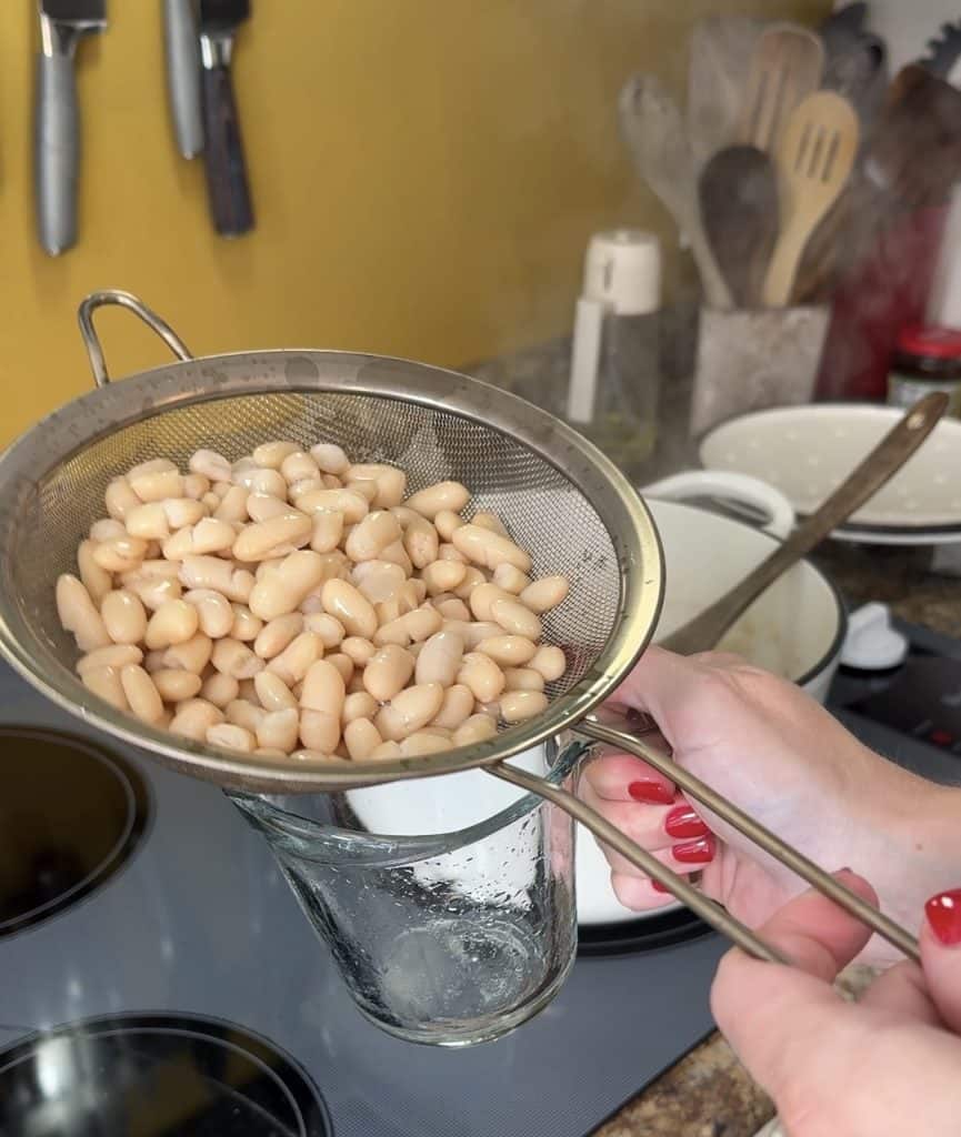 adding white beans to tuscan chicken soup