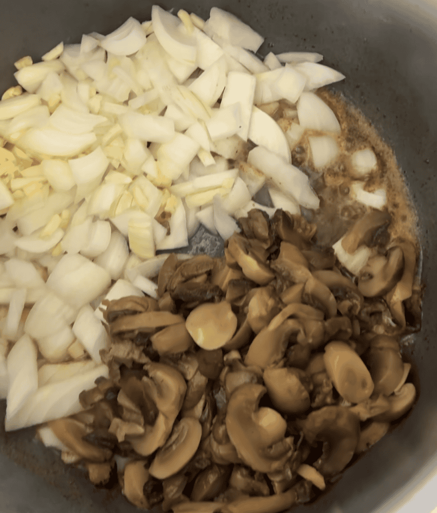mushrooms and onions cooking in an instant pot