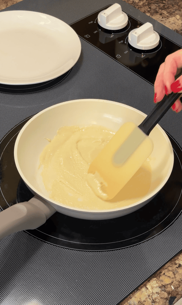 painting the egg roll wrapper batter thinly on a non stick pan