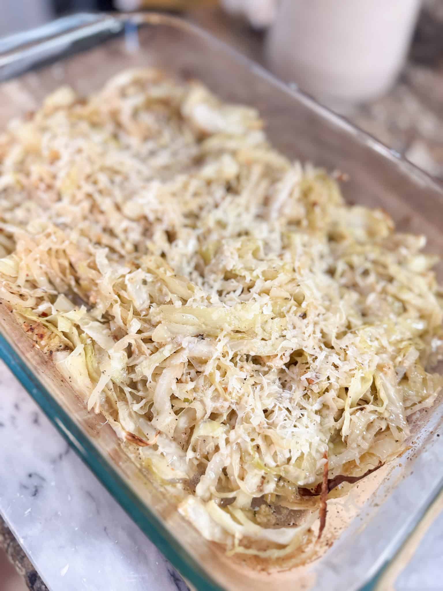 Buttery Garlic Parmesan Baked Cabbage in a casserole dish